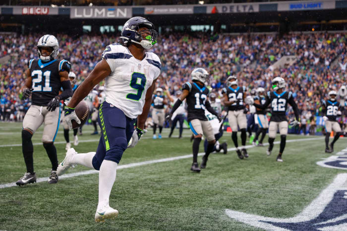 Sep 24, 2023; Seattle, Washington, USA; Seattle Seahawks running back Kenneth Walker III (9) celebrates after rushing for a touchdown against the Carolina Panthers during the fourth quarter at Lumen Field. Mandatory Credit: Joe Nicholson-USA TODAY Sports